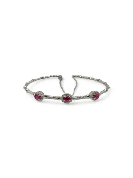 STRETCHABLE WHITE GOLD OVAL RUBY BANGLE